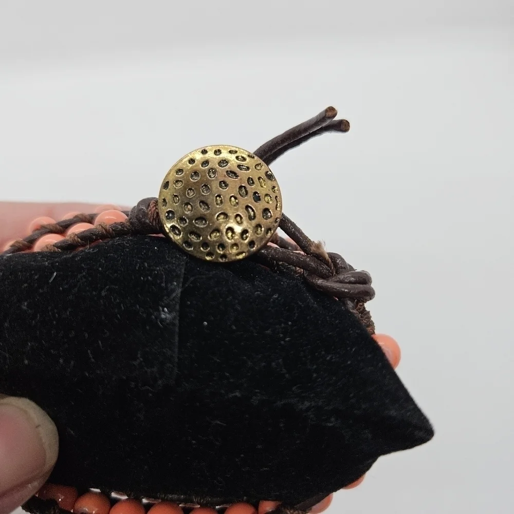 brown leather cord wrap bracelet with coral orange beads